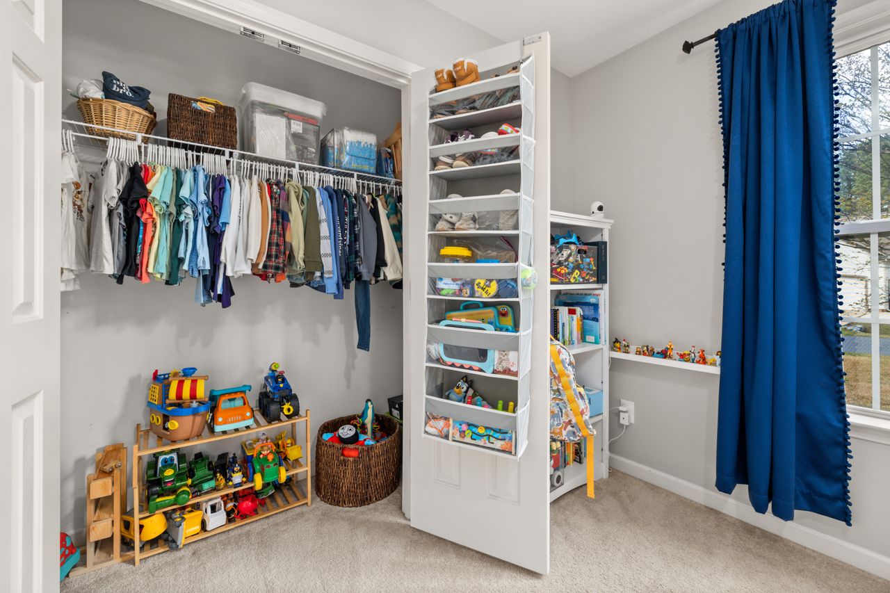 Crafting Captivating Headlines: Your awesome post title goes here A neatly organized childrens closet featuring clothes, toys, and storage solutions.